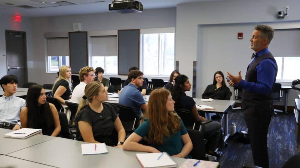 David Mascio speaks to students in a classroom