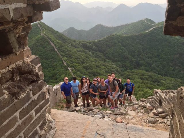 Jason Ward with students at the Great Wall of China