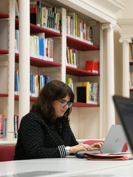 Student working on laptop in Madrid, Spain.