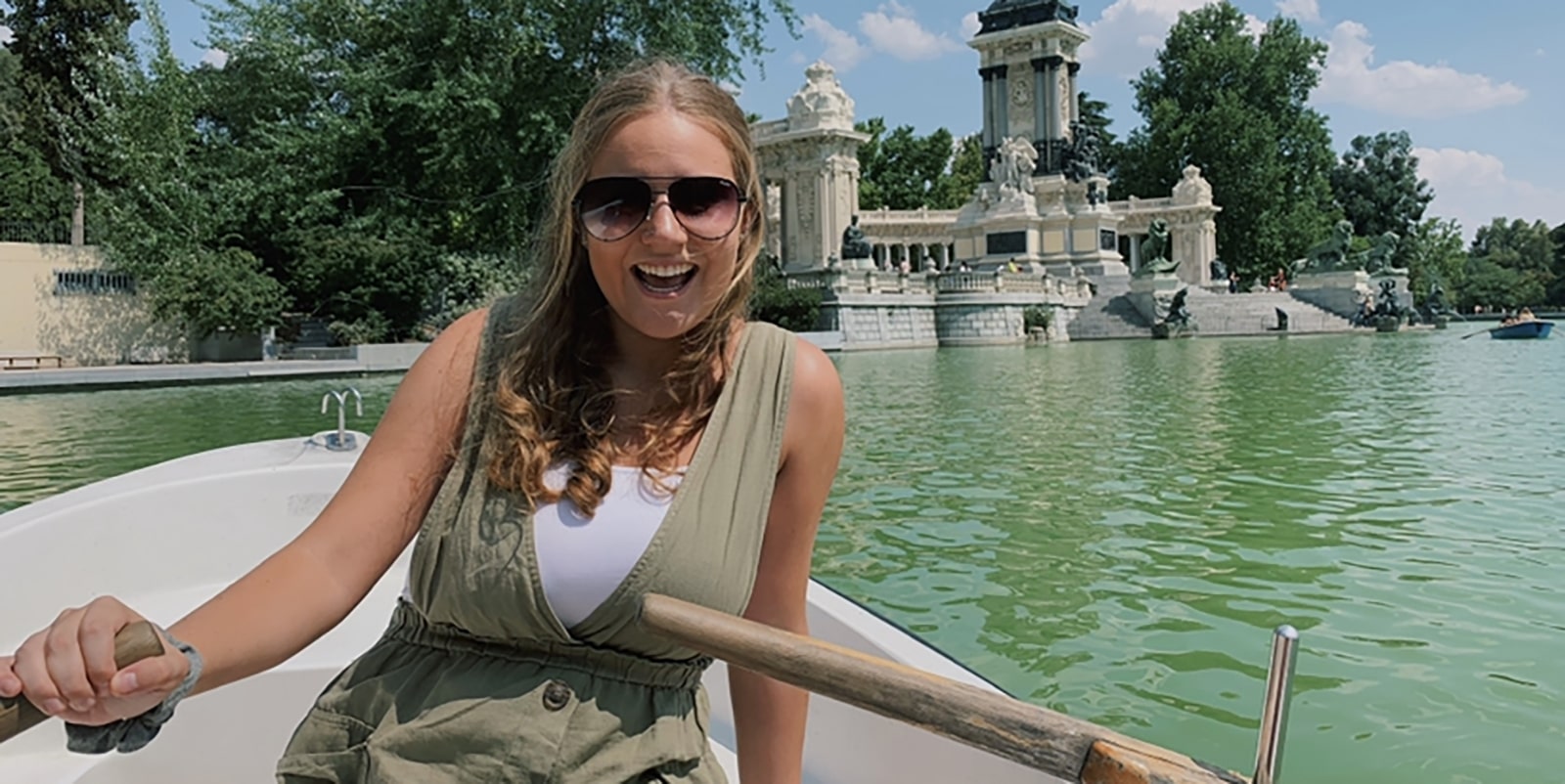 A student from the University of Florida Warrington College of Business' Master of International Business program in a row boat on a river during a study abroad trip