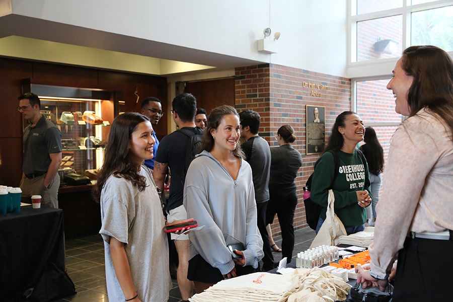 University of Florida students speak with a representative from the Warrington College of Business' accounting program about qualifying for a minor