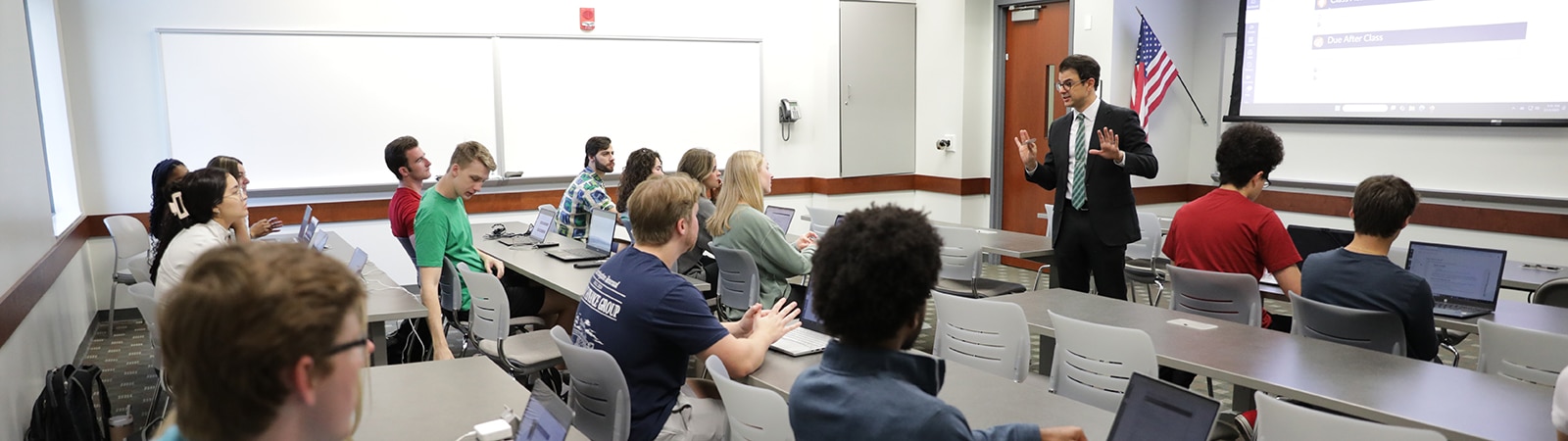 Students in class with professor Sean Trainor.