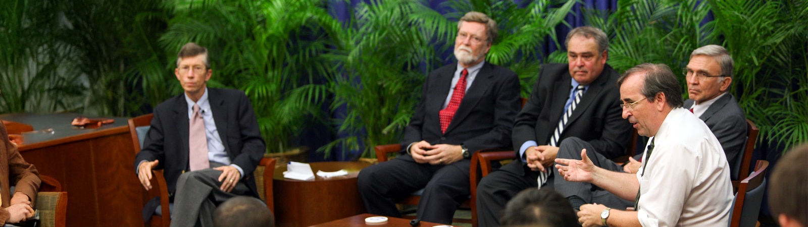 University of Florida business faculty engage in a panel discussion in front of an audience