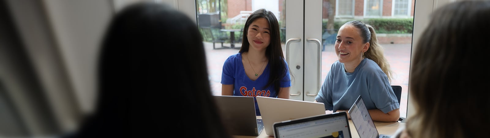 Happy students working in a group.