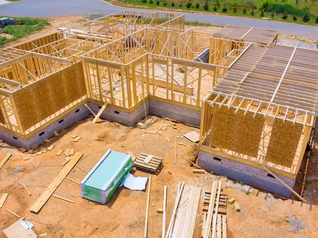 A framed-in home in a new residential development